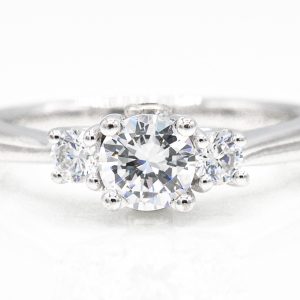 14K White Gold 3-Stone Cubic Zirconia Ring with Surprise Cubic Zirconias
