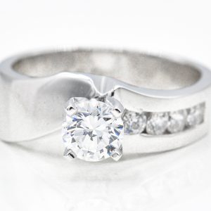 Platinum Cubic Zirconia Ring with 4-Stone Cubic Zirconias on One Side