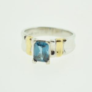 18YW Ladies Solitaire Synthetic Blue Topaz Ring